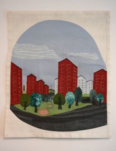 Textilkonst i brodyr föreställande Brunnsbo.