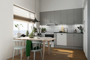 Kök i en nybyggd lägenhet med bord och stolar